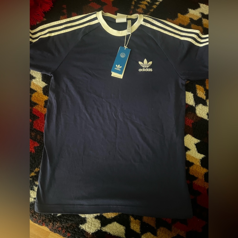 Adidas three stripe tee.